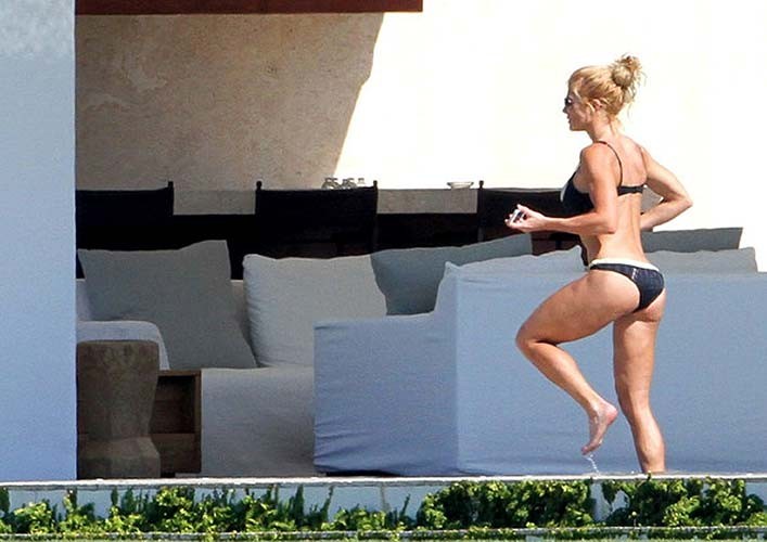 Torrie Wilson exposing sexy body and hot ass in bikini on pool #75276356