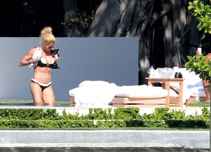 Torrie Wilson exposing sexy body and hot ass in bikini on pool #75276363