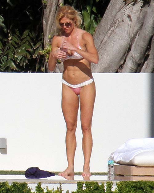 Torrie Wilson exposing sexy body and hot ass in bikini on pool #75276408