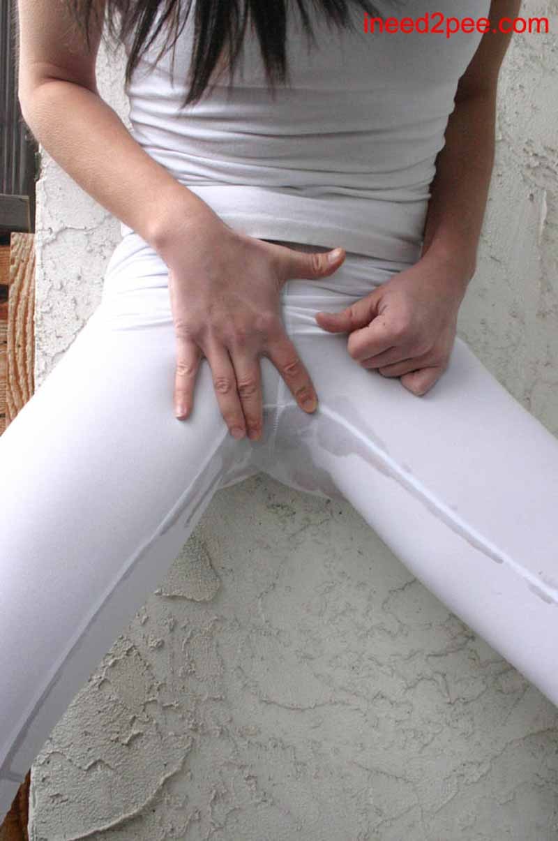 Very sexy petite chick peeing in her white tight pants #76585022