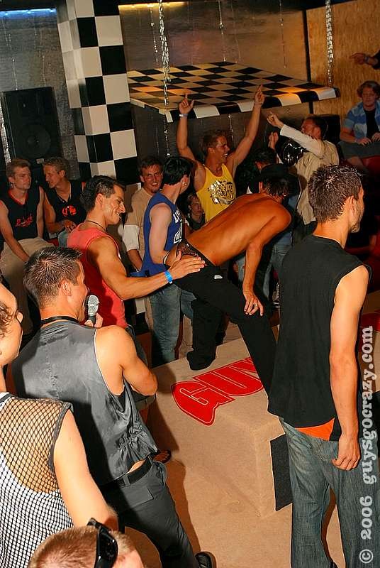 Gay guys fighting for a taste of malestrippers dick at an orgy #77000234