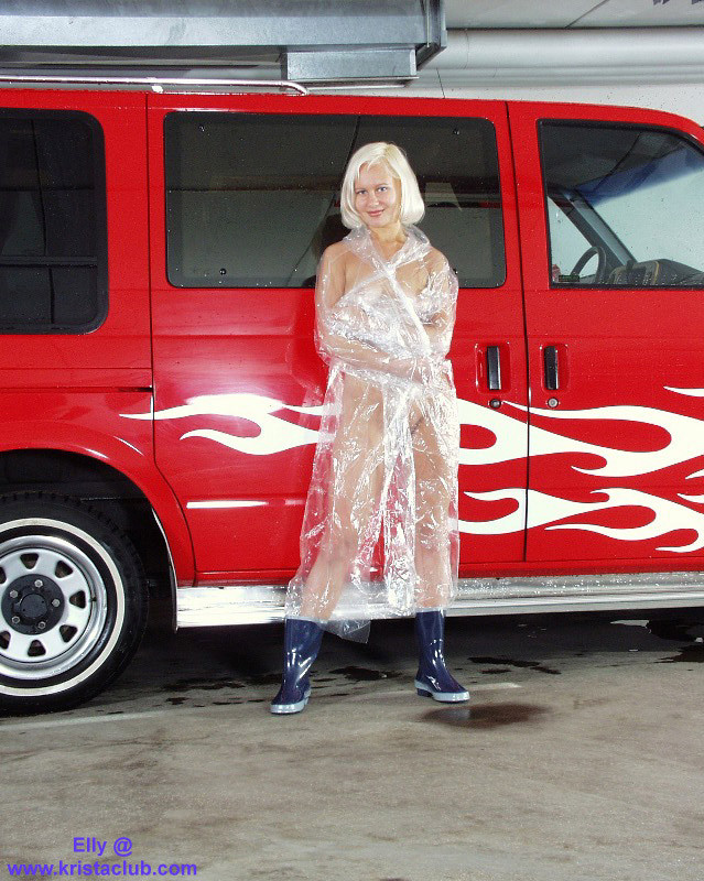 Hot blond girl in rainwear and rubber boots #73287165