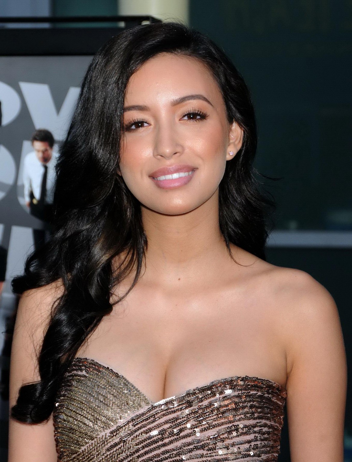 Christian Serratos shows huge cleavage wearing a tube mini dress at the 'Now You #75231417