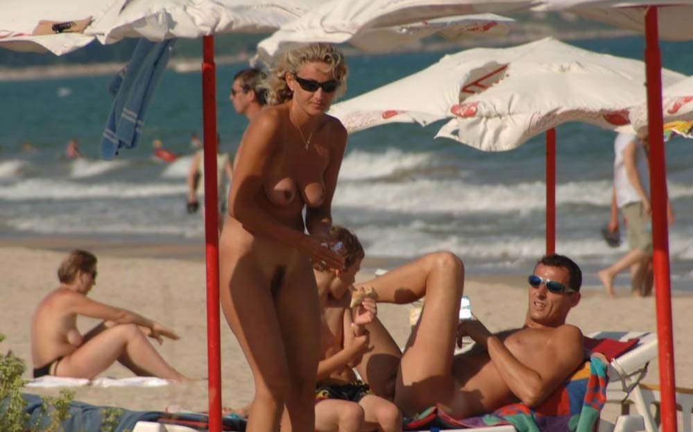 Busty milf not shy about posing nude at the beach #72254052