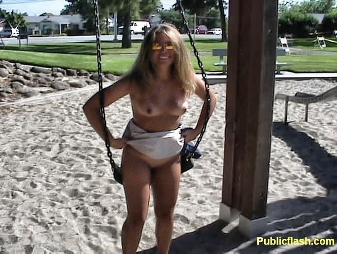 Public Park Flasher Fully Nude Outdoors on a Swing #78925047