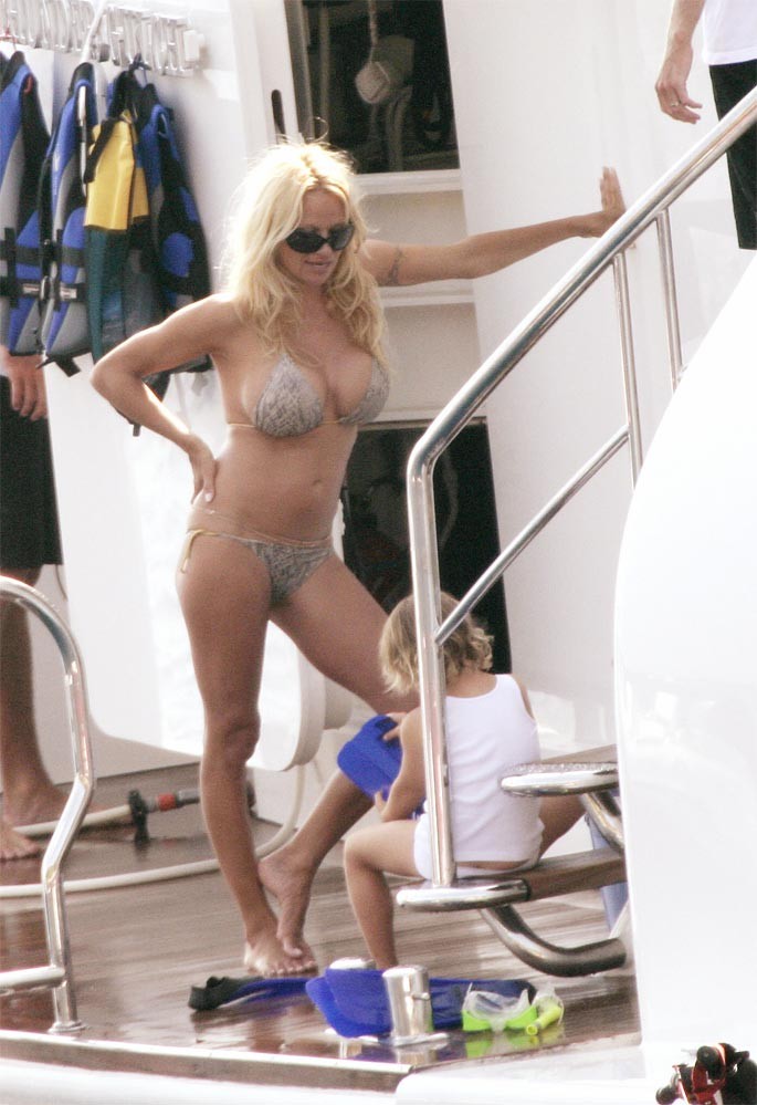 Pamela Anderson posing sexy in small red bikini paparazzi pics #75438402