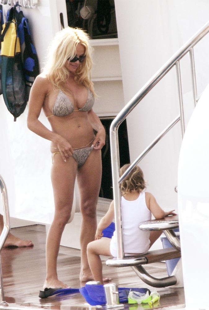 Pamela Anderson posing sexy in small red bikini paparazzi pics #75438433