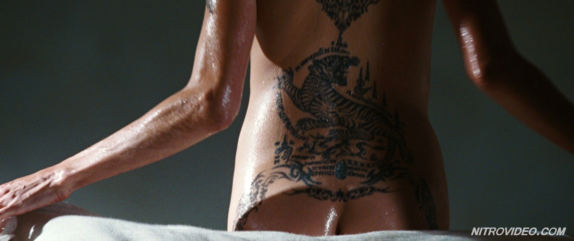 Angelina Jolie exposing her hot tattooed body #70256228