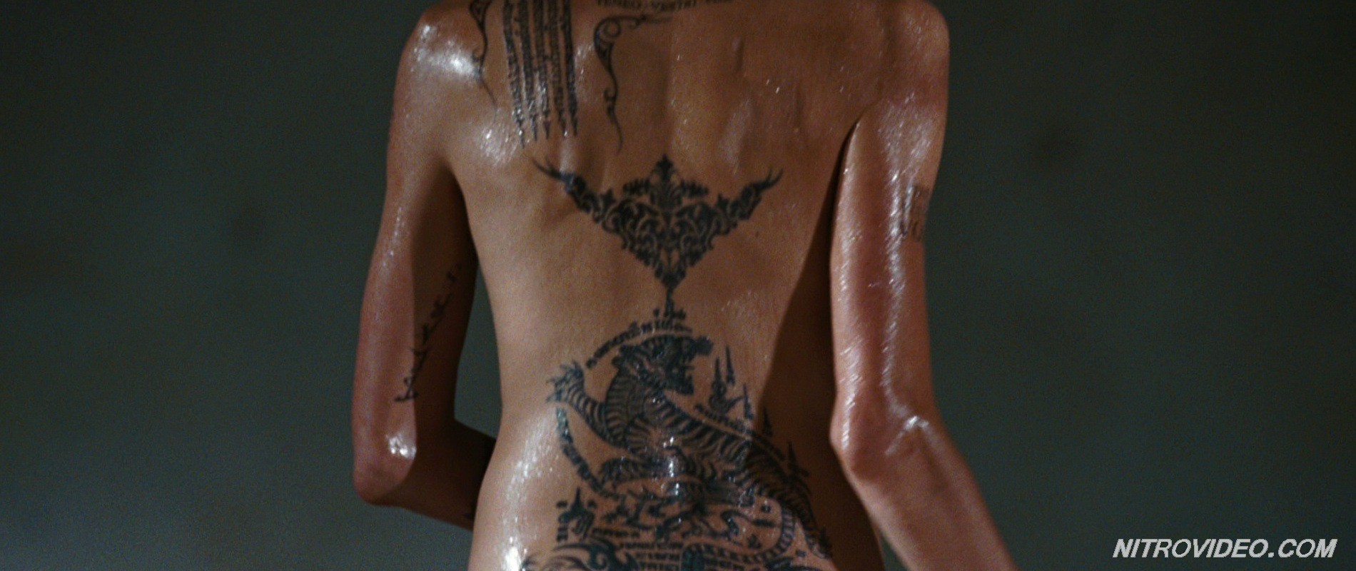 Angelina Jolie exposing her hot tattooed body #70256239