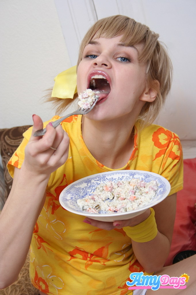 Funny teen girl eating food #77773402