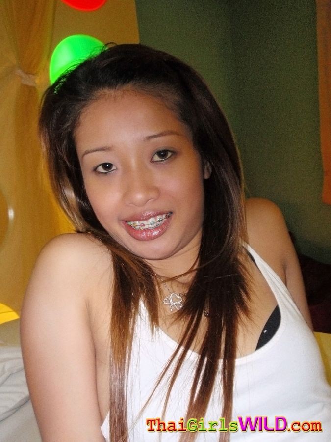 Amateur Thai girlfriend with braces #67162949