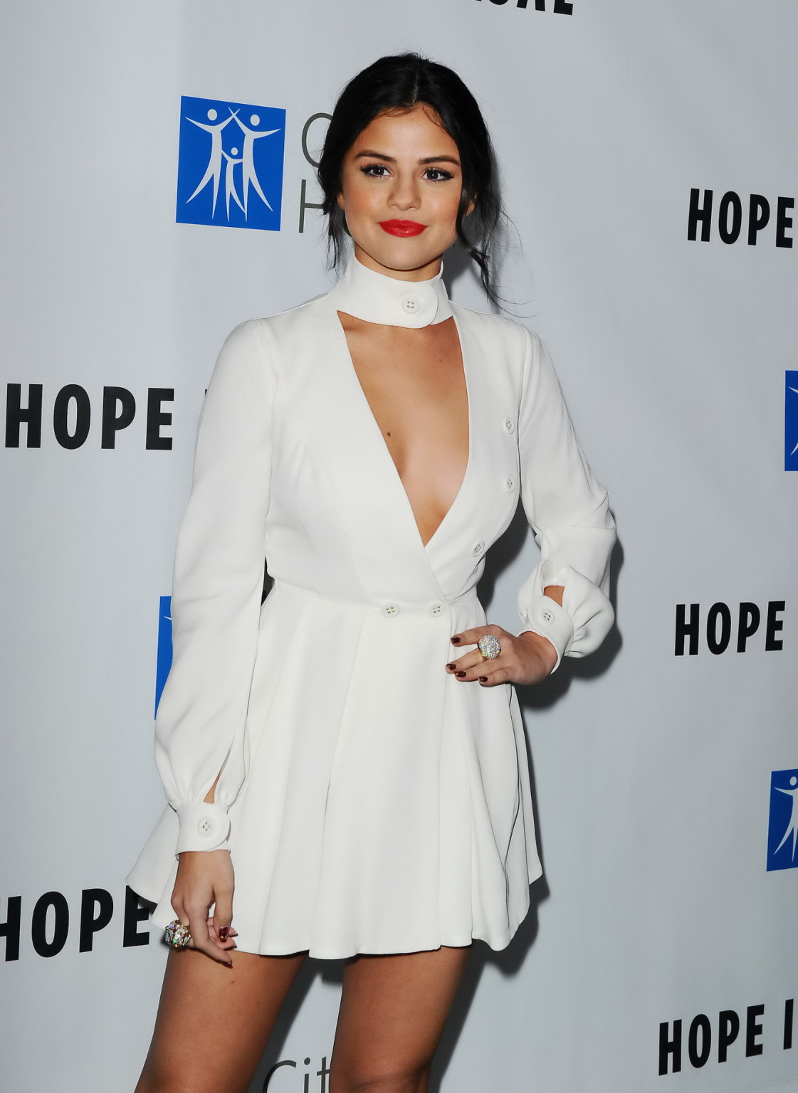 Selena Gomez cleavy and leggy in tiny white dress #75150533