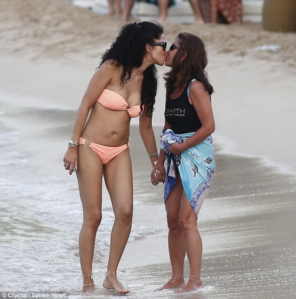 Kimora Lee Simmons wearing a strapless bikini on a beach in St. Barts #75209034