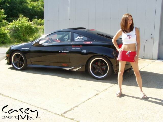 Asian teen posing outside with cars #70012445