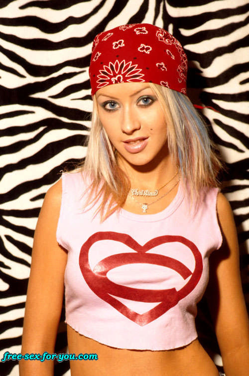 Christina Aguilera montrant ses fesses et ses seins dans un haut transparent
 #75423977