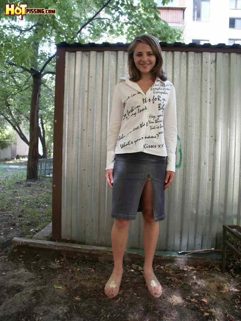 Cute girl pissing outside #76592359