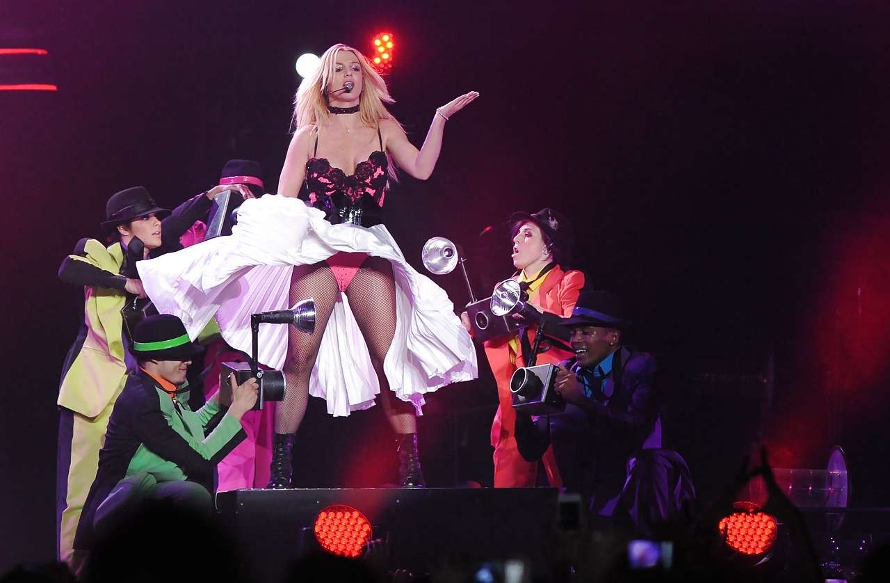 Britney Spears in red panties and fishnets performing on stage paparazzi picture #75283616