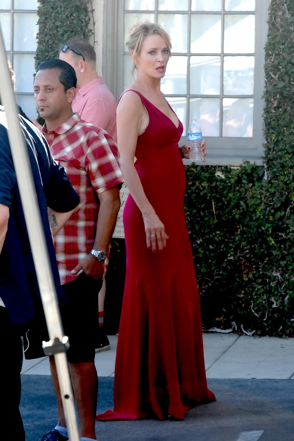 Uma Thurman showing huge cleavage on the set #75153404