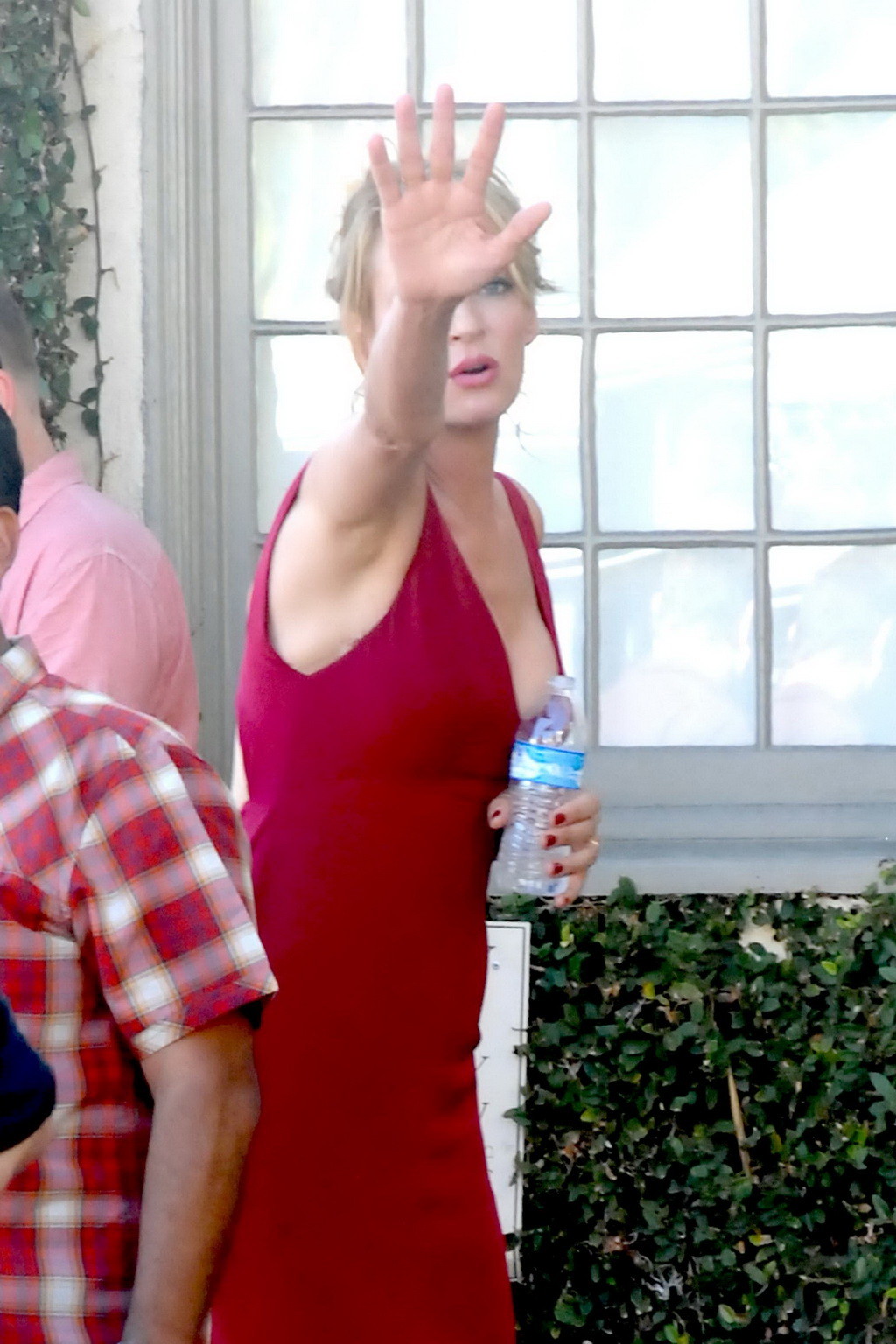 Uma Thurman showing huge cleavage on the set #75153423