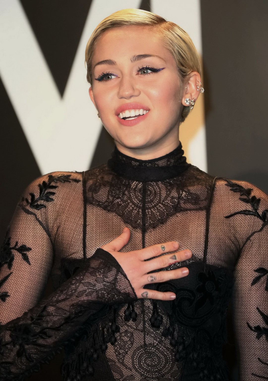 Miley Cyrus wearing see through dress and lingerie at Tom Ford 2015 Womenswear C #75172043