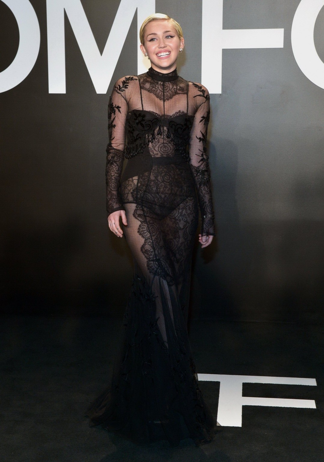 Miley Cyrus wearing see through dress and lingerie at Tom Ford 2015 Womenswear C #75172056