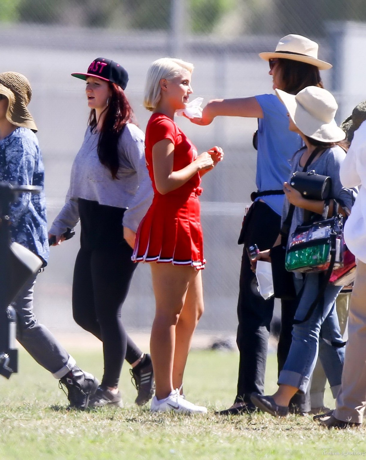 Dianna Agron in cheerleader outfit flashing her red panties on Glee season 6 set #75185168