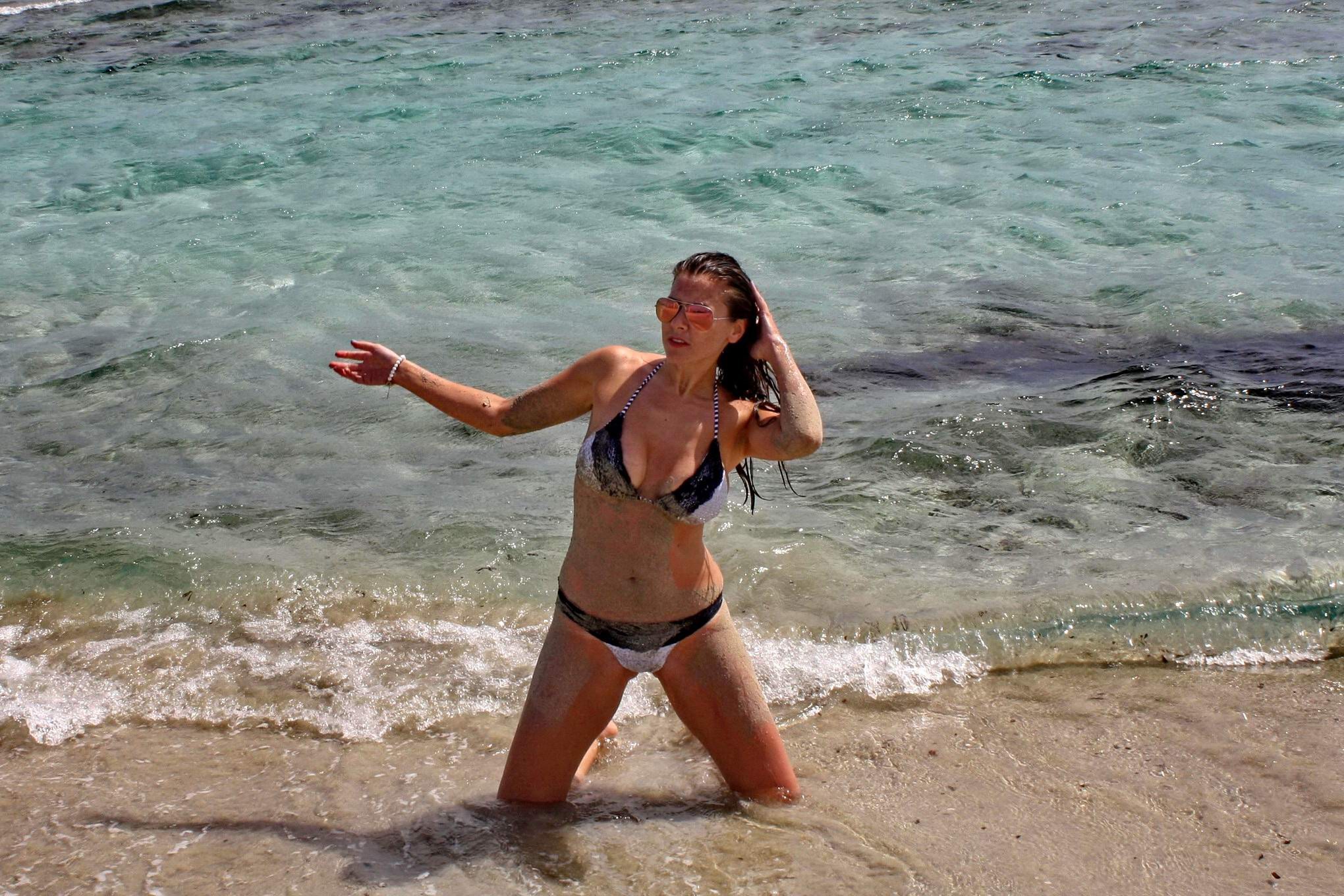 Imogen Thomas shows off her curvy body wearing a skimpy monochrome bikini on a b #75194695