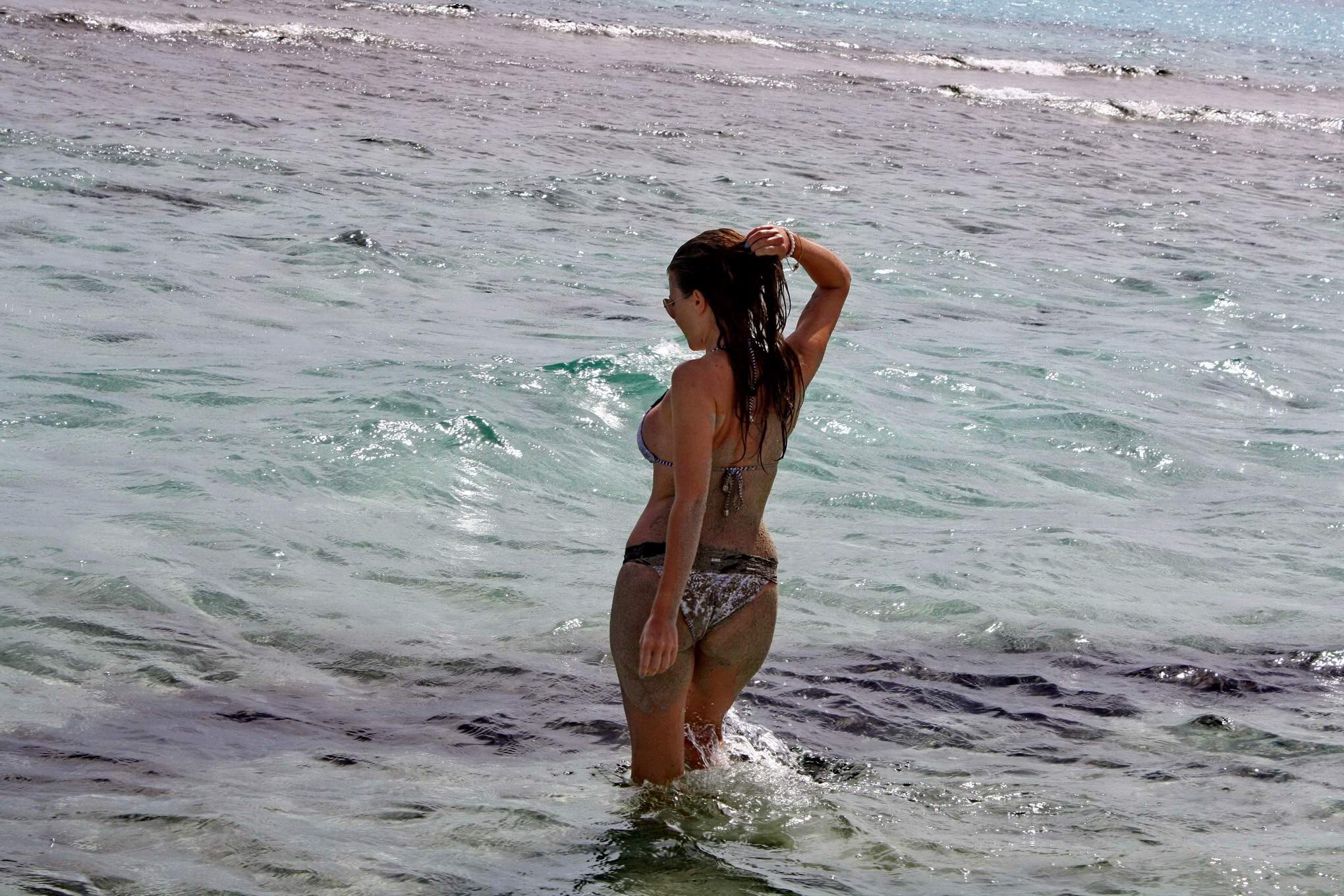 Imogen Thomas shows off her curvy body wearing a skimpy monochrome bikini on a b #75194716