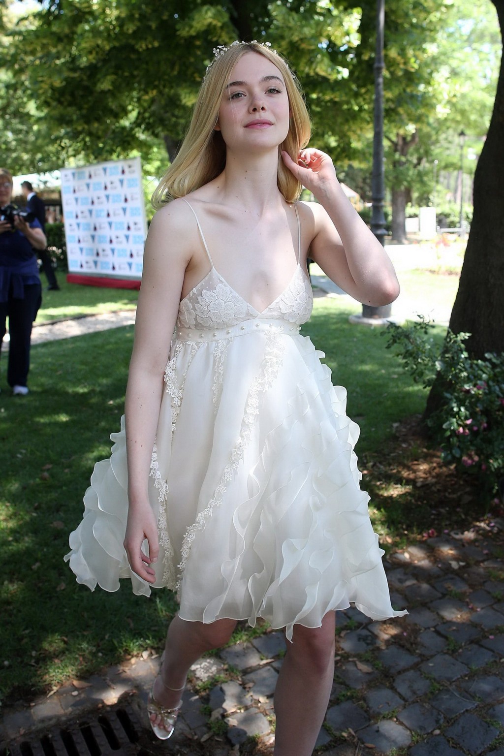 Elle Fanning cleavy and leggy in white lace dress #75141752