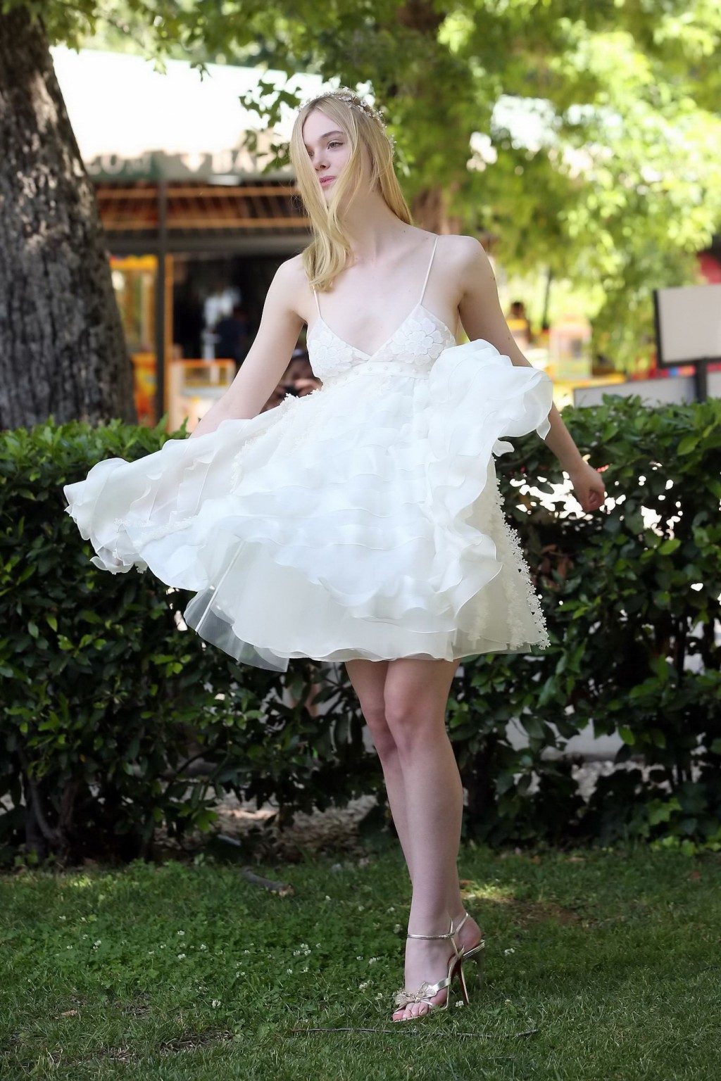 Elle Fanning cleavy and leggy in white lace dress #75141763