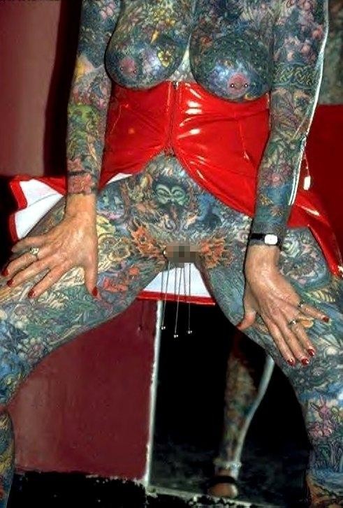 Extreme tattoo and piercing #73235339