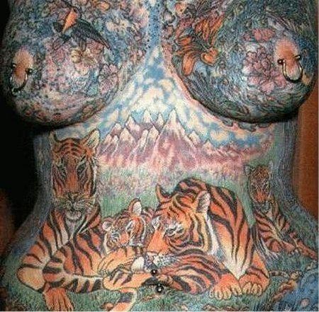 Extreme tattoo and piercing #73235343