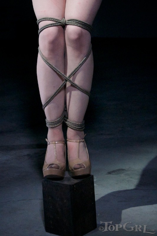 Hazel Hypnotic is rope bound wearing high heels in dark dungeon #70892141