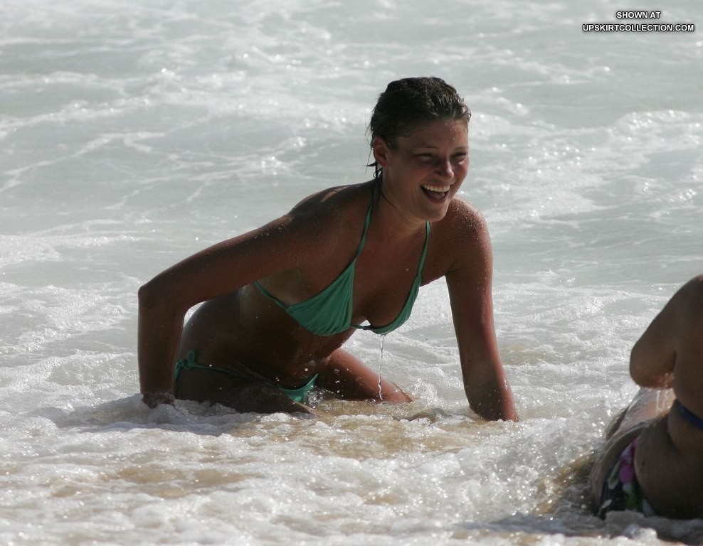 Bikini girls love getting sun tanned on the beach #73178547