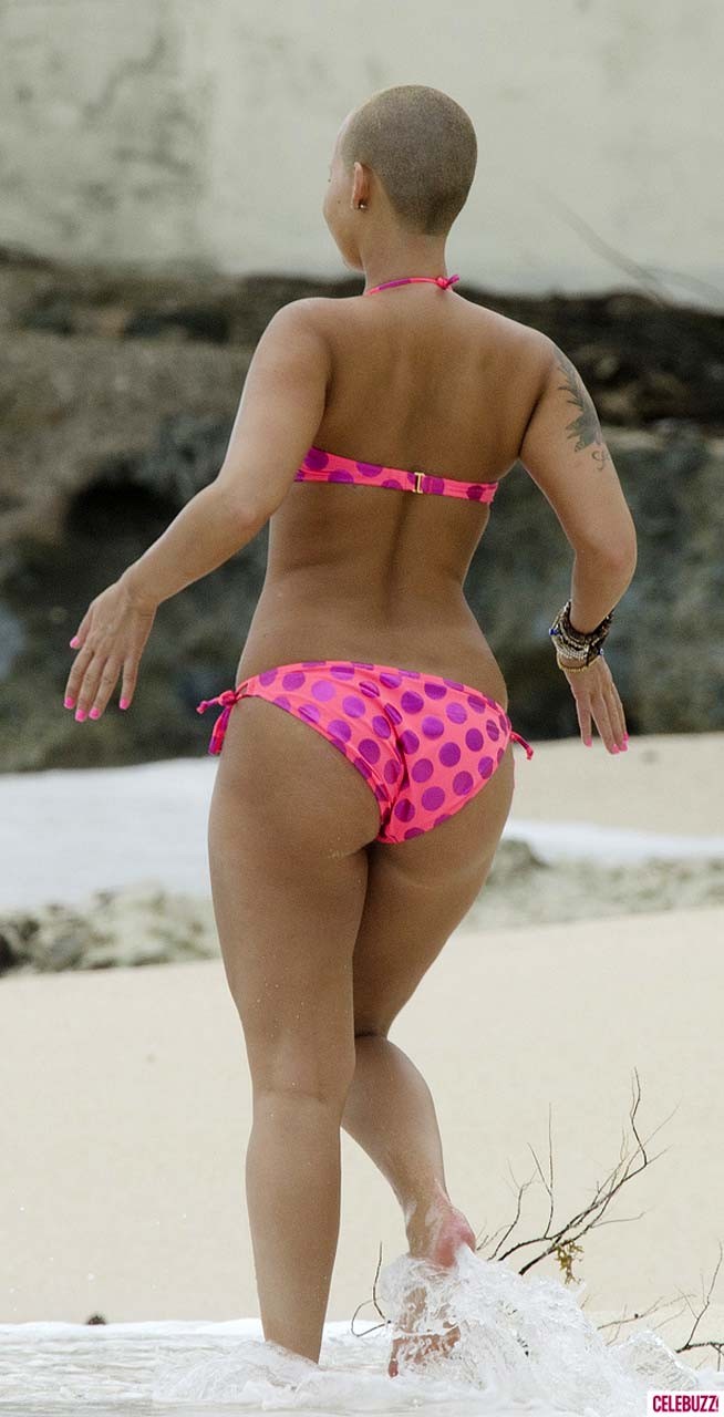Amber Rose exposing her huge boobs and looking sexy in bikini on beach paparazzi #75309064