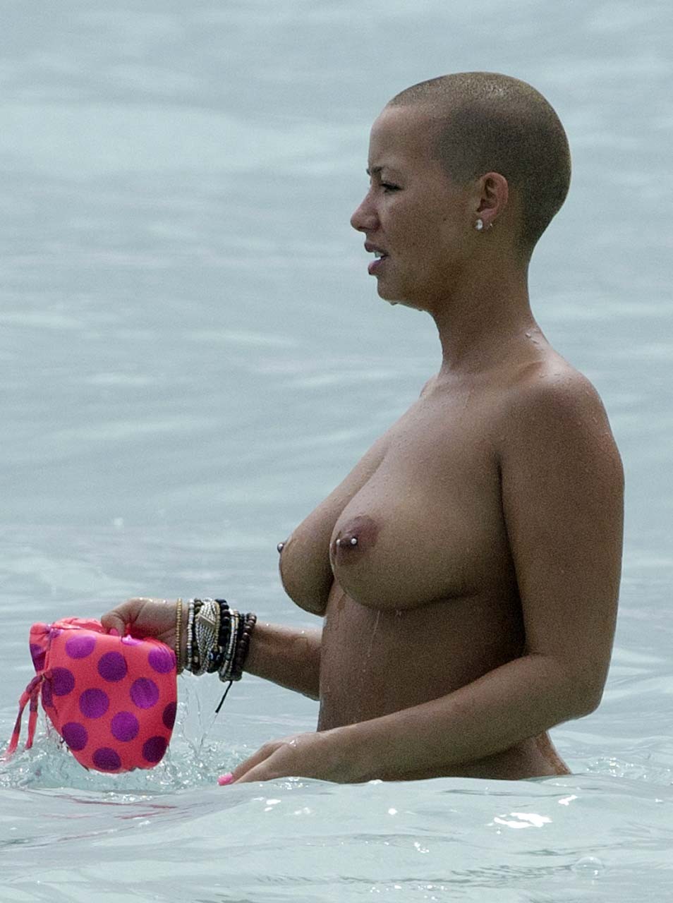 Amber Rose exposing her huge boobs and looking sexy in bikini on beach paparazzi #75309092