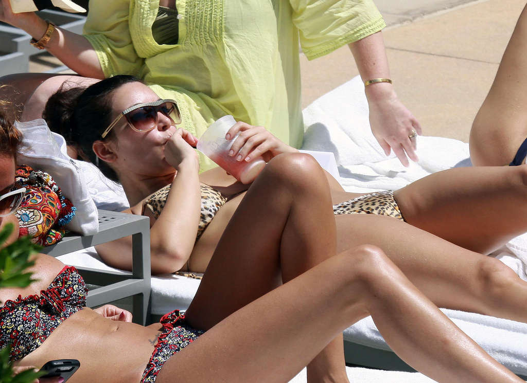 Kim Kardashian in leopard print bikini on pool paparazzi pictures and exposing h #75345090