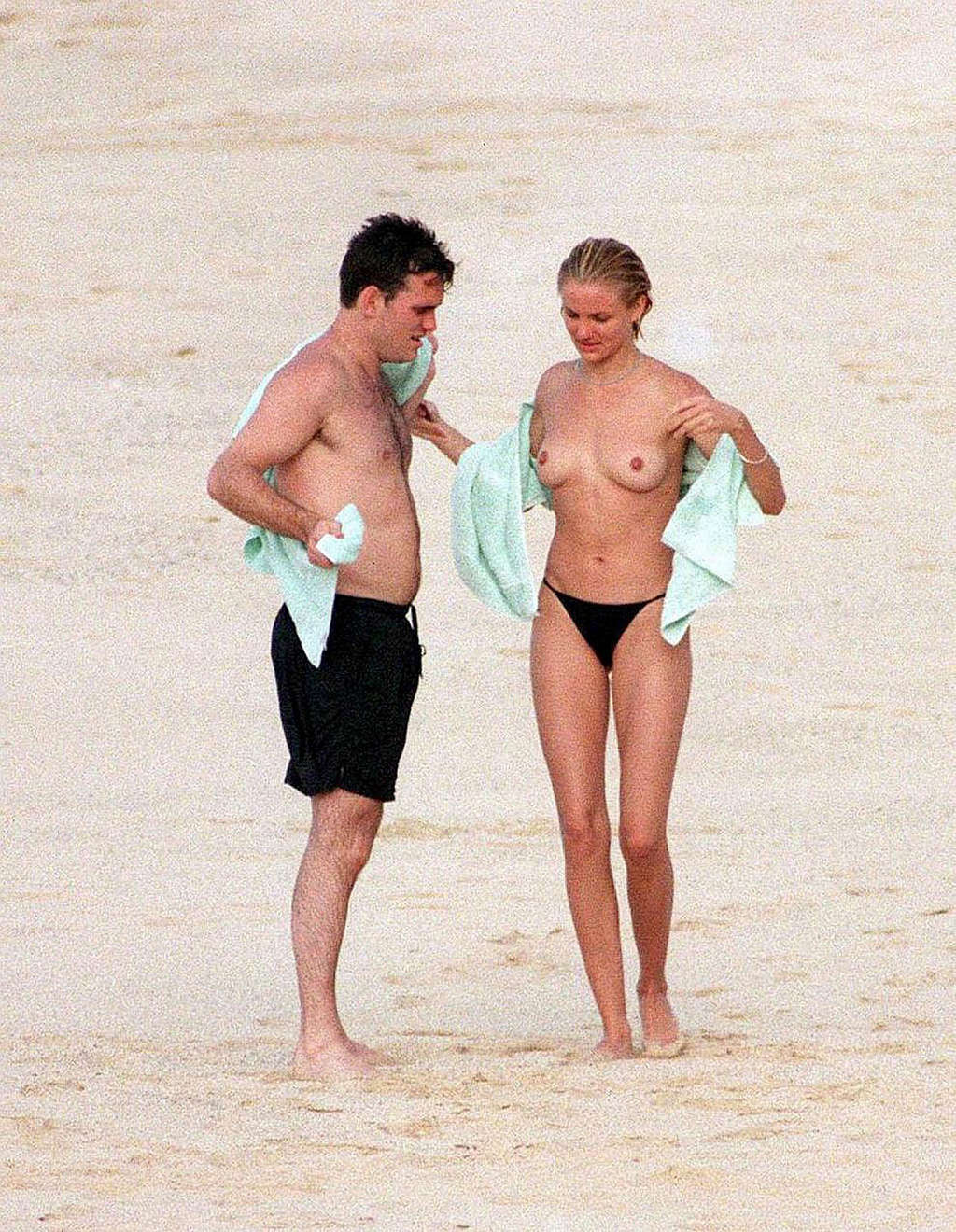 Cameron Diaz showing sexy ass in thong and enjoying on beach in topless #75365889