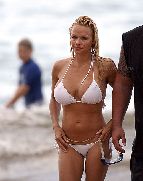 Pam Anderson shows nice body and great tits on the beach #75377386
