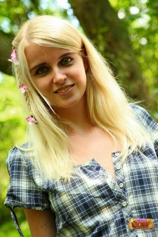 Blonde teen cutie shows perfect body posing in a forest #78606213