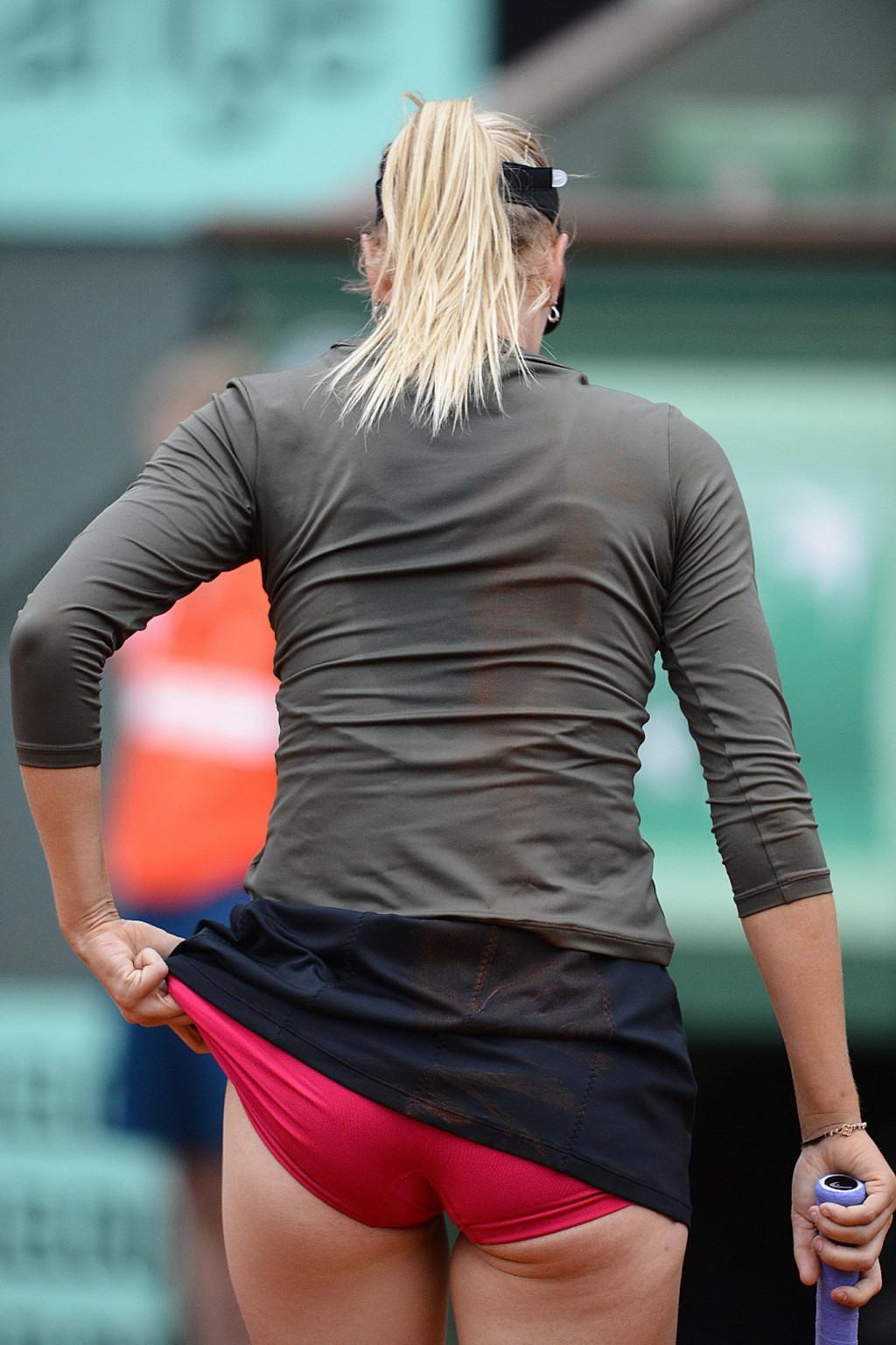 Maria Sharapova flashes her pink panties while playing at Roland Garros #75261009