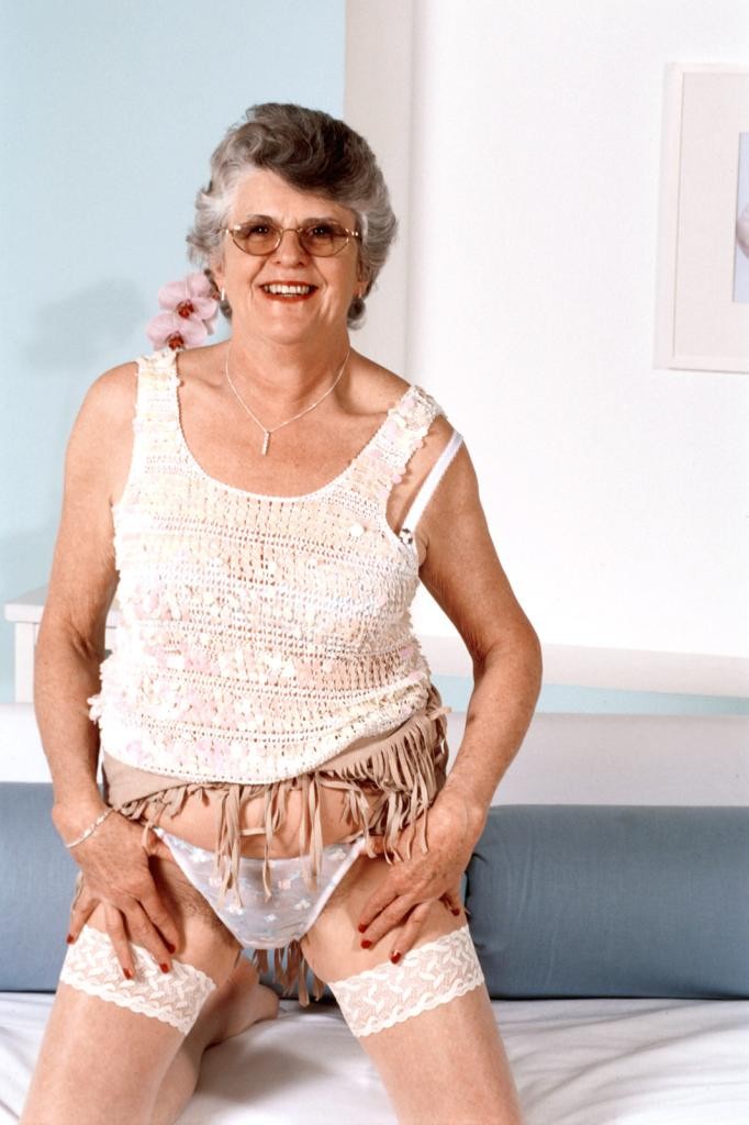 Granny in white stockings loves stuffing dildo in her twat #77250630