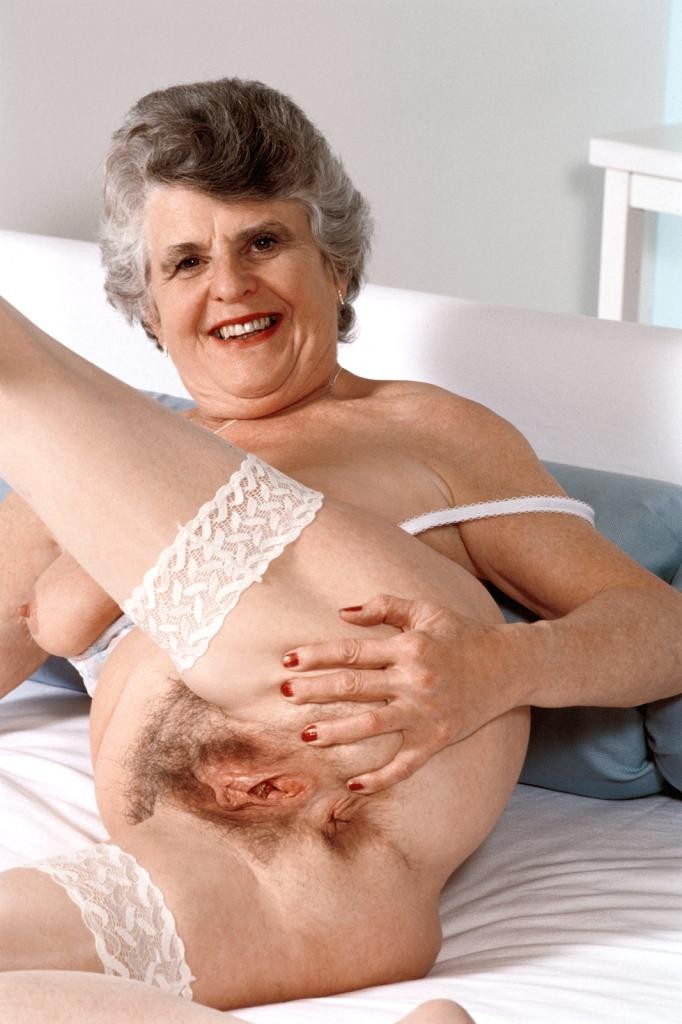 Granny in white stockings loves stuffing dildo in her twat #77250694