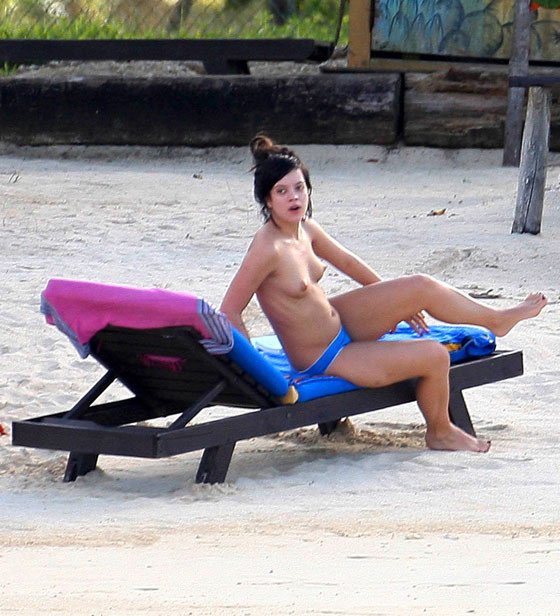 Lily Allen nude perky topless on the beach #75390320