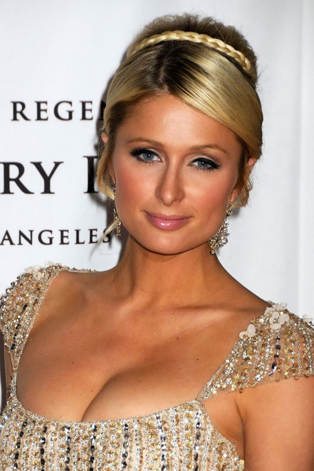 Paris Hilton shows cleavage wearing low cut dress at Race to Erase MS Gala in LA #75306407