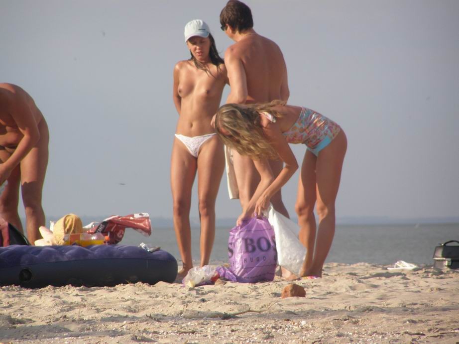 Smoothest nudists play together in the warm water #72252222