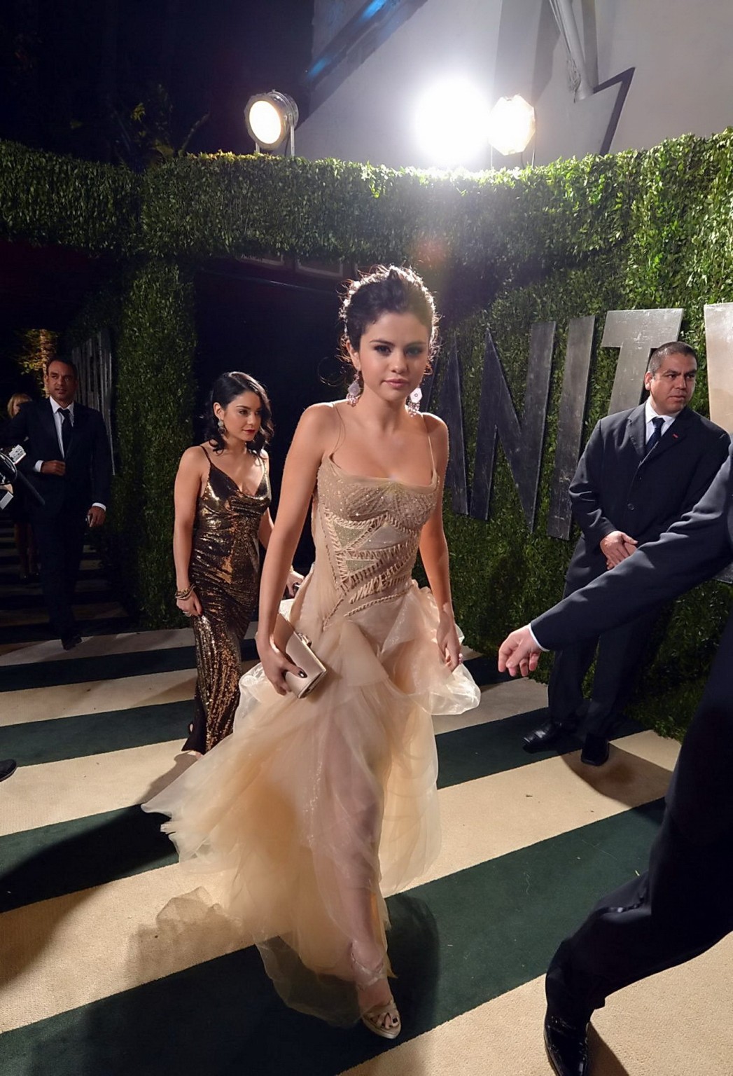 Selena Gomez and Vanessa Hudgens showing their cleavages at Vanity Fair Oscar Pa #75240707
