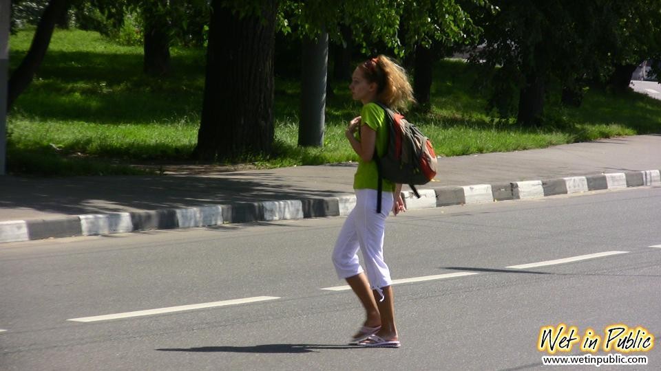Humiliated slut who just pissed her white breeches right in the street #78594954