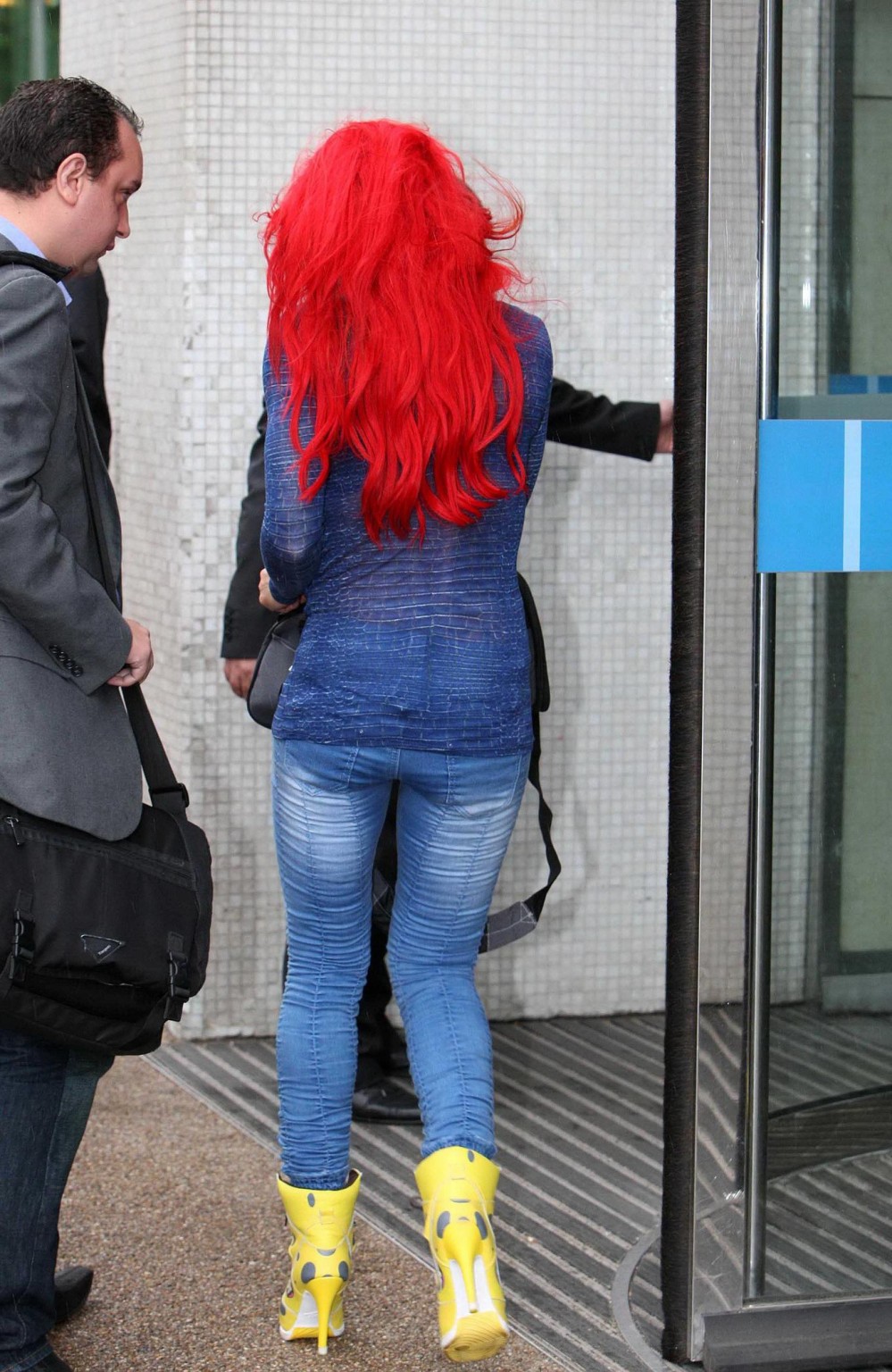 Jodie Marsh showing her curvy body in tight top  jeans leaving ITV Studios #75257185