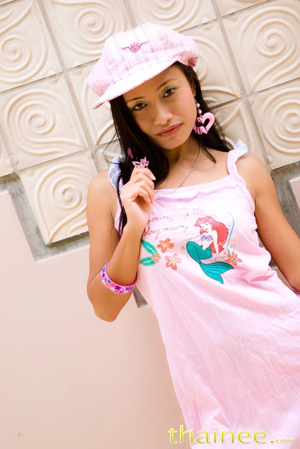 Thai teen girl in pink hat